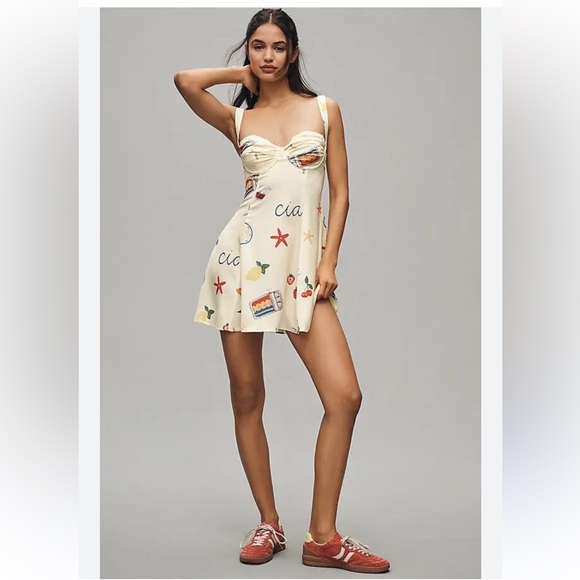 For Love And Lemons Dresses & Skirts - For Love & Lemons Ciao mini dress NWT butter yellow w/a Positano print. Size S
